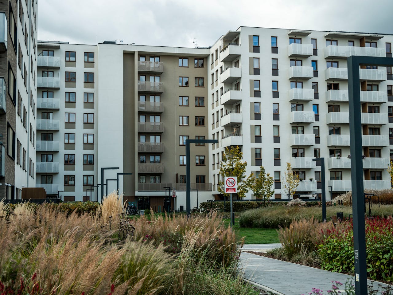 Crafting Captivating Headlines: Your awesome post title goes here High-rise residential buildings with landscaped area in an urban setting.